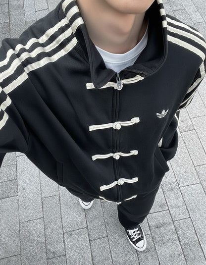Formova black CNY jacket with premium fabric and sleek festive streetwear design